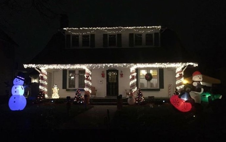 The Salcherts' holiday decorations at night.
