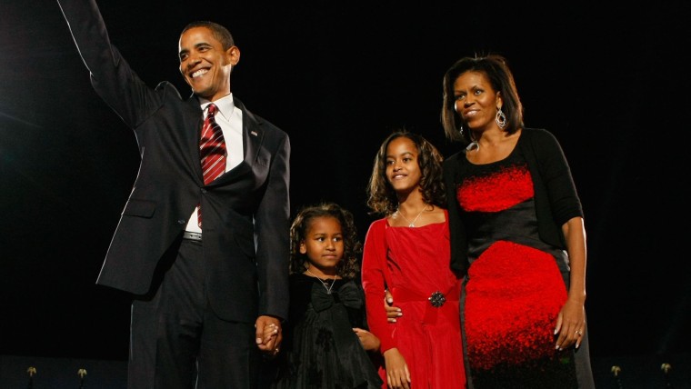 Image of Barack Obama with his family on 2008 Election Night gathering in Chicago