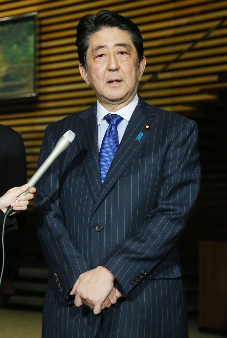 Image: Japan's prime minister Shinzo Abe announced his visit to reporters Tokyo Monday.
