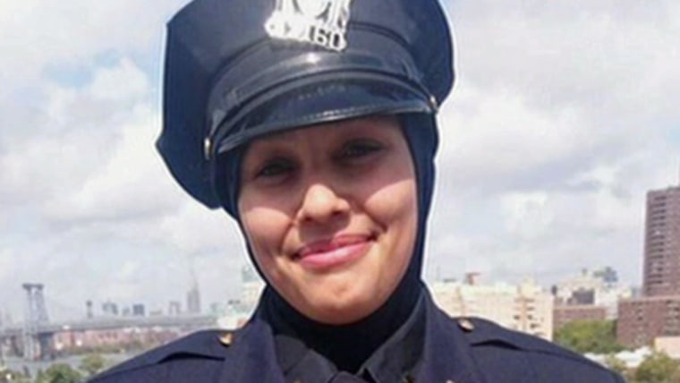 NYPD Officer Aml Elsokary had dropped off her 16-year-old son around 6 p.m. Saturday and, after parking her car, returned to find Nelson allegedly shoving him.