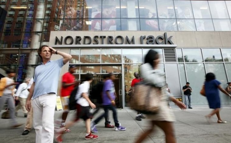 People walk past the Nordstrom Rack store, in New York's Union Square
