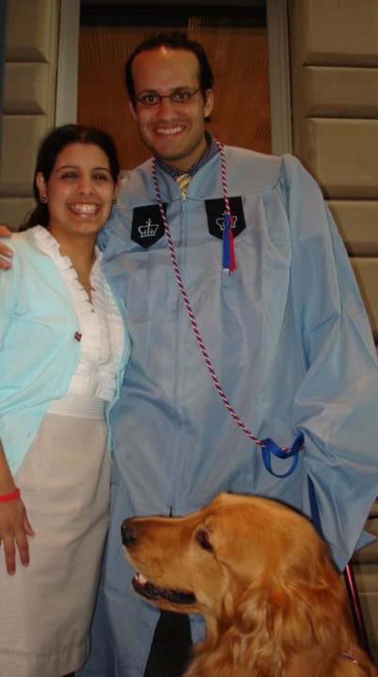 Carmen Cusido (left) and Luis Carlos Montalvan (right) graduating from Columbia Journalism School alongside his service dog named Tuesday.