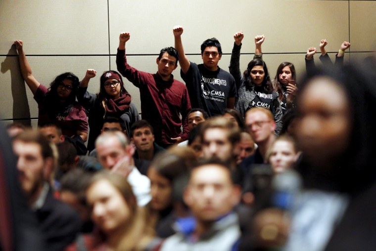 Image: Undocumented Texas A&amp;M students and their supporters protest white nationalist leader Richard Spencer of the National Policy Institute speaks on campus on Dec. 6, 2016.