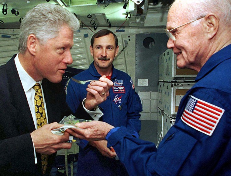 Image: President Clinton gets a helping of a space shuttl