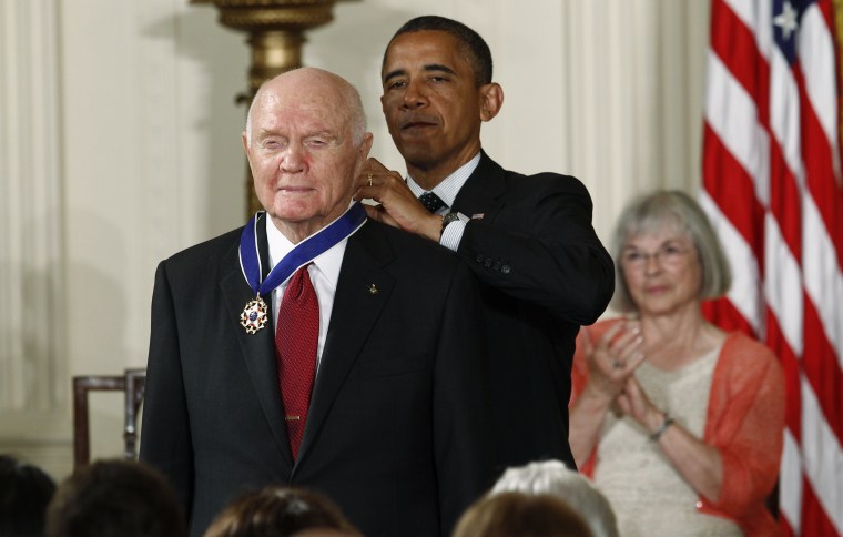 U.S. President Obama awards a 2012 Presidential Medal of Freedom to astronaut Glenn during ceremony in the East Room of the White House in Washington