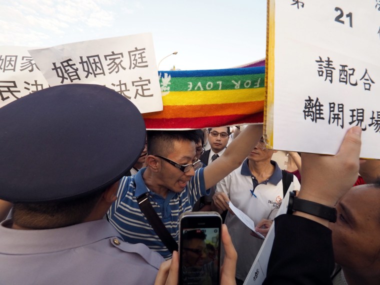 Image: Taiwan pro-family value groups protest against legalizing same-sex marriage