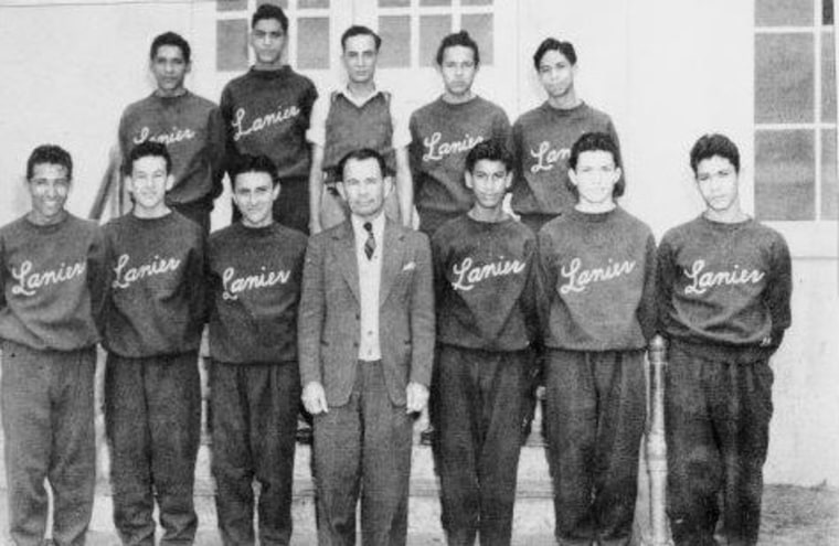 The all-Mexican-American basketball team at Lanier High School in San Antonio, Texas with Coach William "Nemo" Herrera in the center.