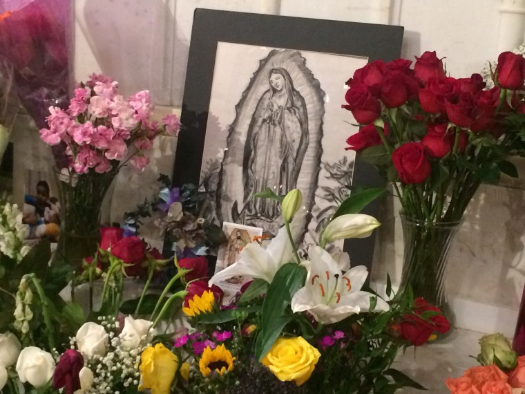 Flowers and offerings to Our Lady of Guadalupe at St. Patricks Cathedral, New York City