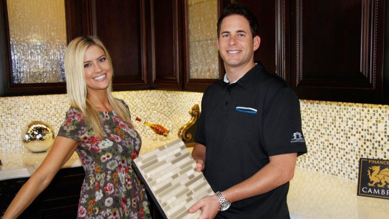 Husband and wife team, Tarek and Christina El Moussa, discuss renovation plans on the set of HGTV's Flip or Flop.