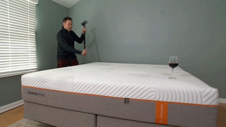 Jeff Rossen takes a sledgehammer to a Tempur-Pedic mattress. Watch out for that glass of wine!