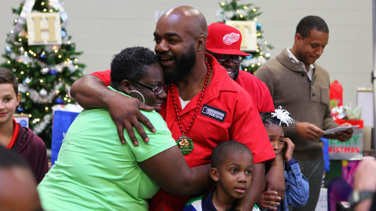 Fred Thomas and Costello Robinson with their families