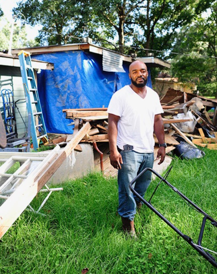 Fred Thomas in front of his home after the Baton Rouge floods in August 2016