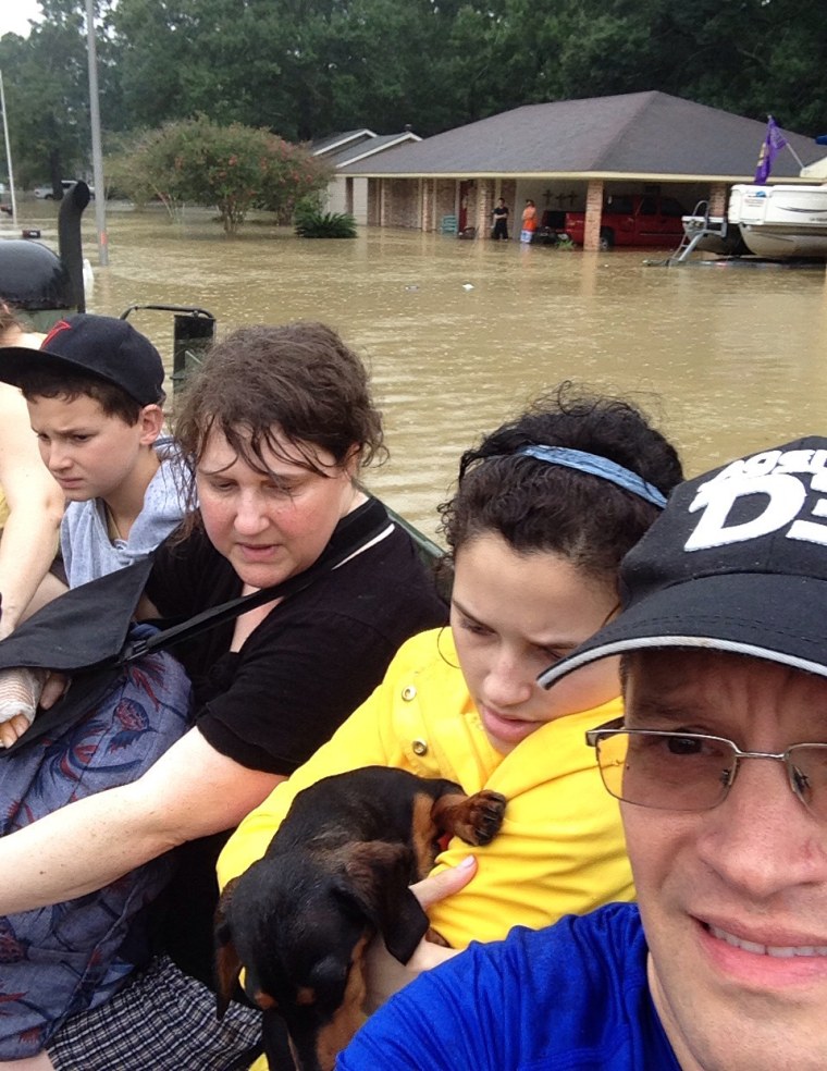 Wendi Nelms and her family evacuating from their home in Baton Rouge after the floods