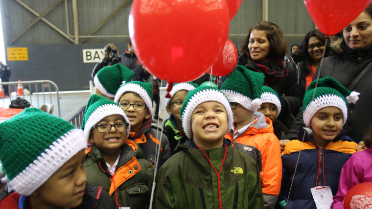 Kids leaving Operation Santa Claus