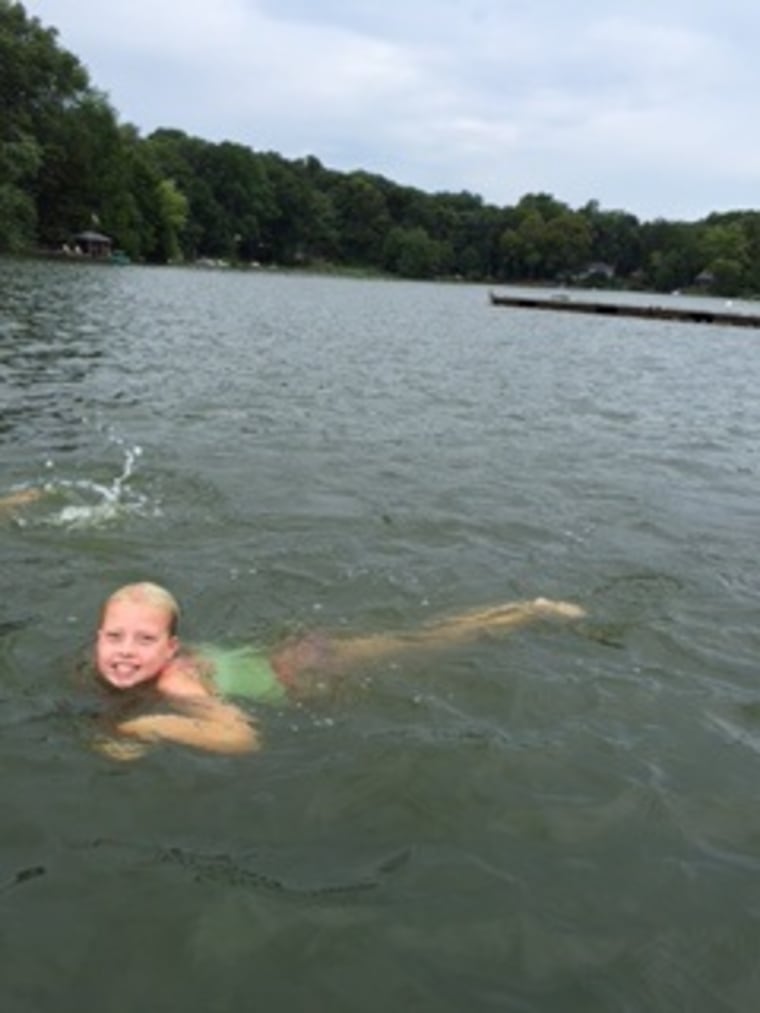 Willow Phelps swimming in the lake in her New Jersey community