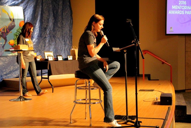 Deena Shoemaker speaking at a Youth Horizons awards party 