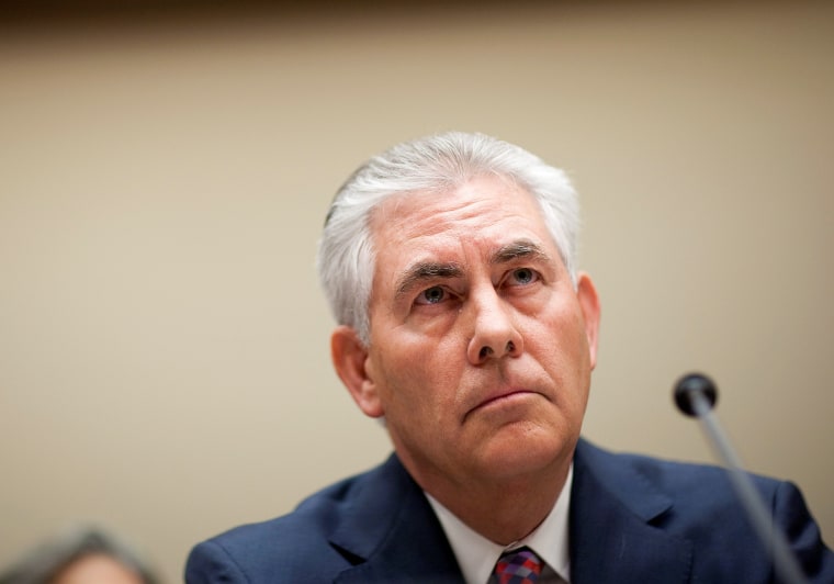 Image: Tillerson, chairman and CEO of ExxonMobil, testifies about the company's acquisition of XTO Energy before the House Energy and Environment Subcommittee on Capitol Hill in Washington