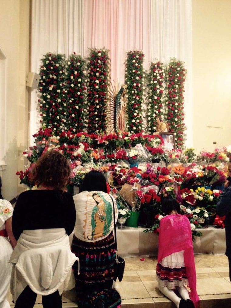 Participants celebrate the apparition of the Virgen de Guadalupe by attending the midnight mass.