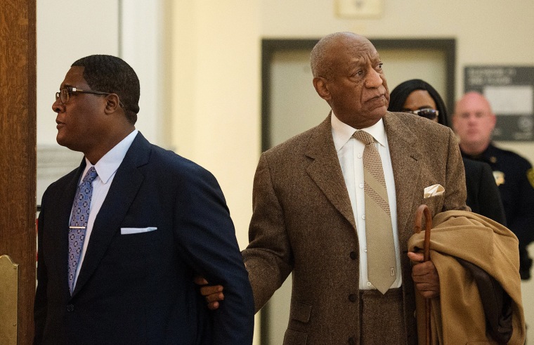 Image: Bill Cosby re-enters Montgomery County Courthouse after a break during the second day of his pre-trial hearing in his sexual assault case in Norristown