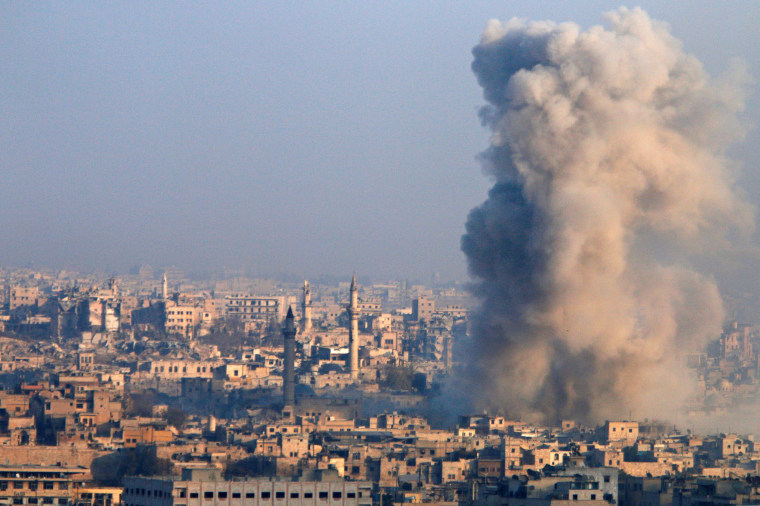 Image: Smoke rises as seen from a government-held area of Aleppo