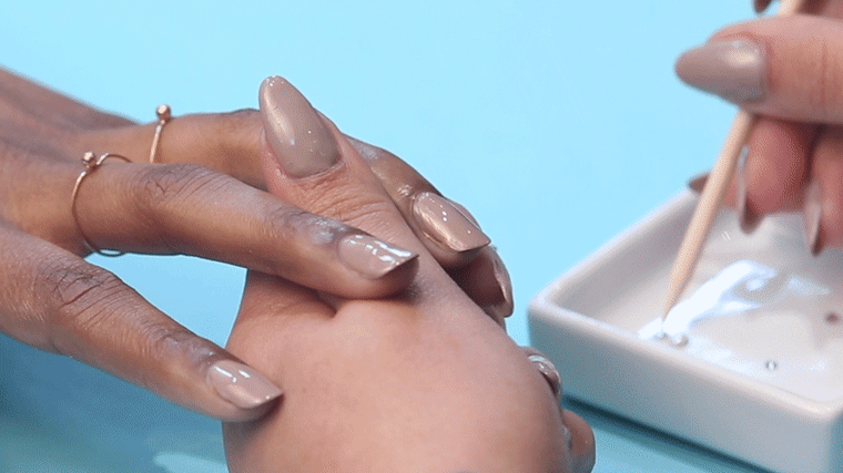 Glittery, pearl-encrusted manicure
