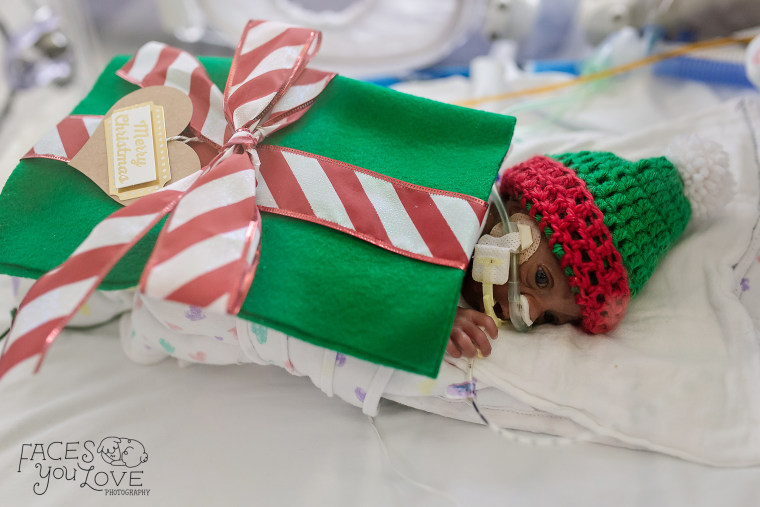 NICU babies dressed as gifts spread cheer this holiday season.