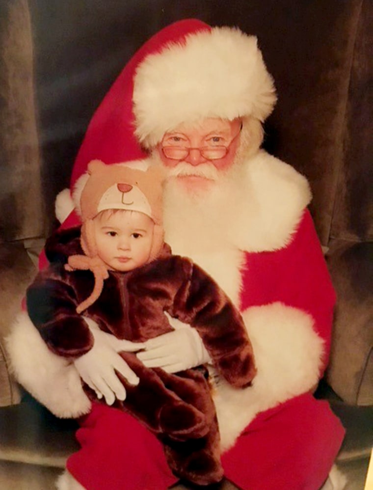Santa holding Linda Dahlstrom Anderson's son Gabriel
