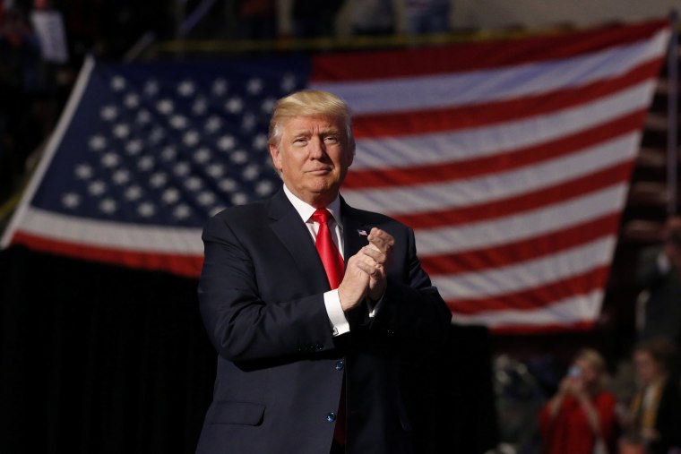 Image: U.S. President-elect Donald Trump arrives to speak during a USA Thank You Tour event at Giant Center in Hershey, Pennsylvania