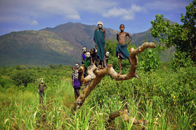 Image: Children from the Suri tribe pose in Ethiopia's southern Omo Valley region near Kibbish