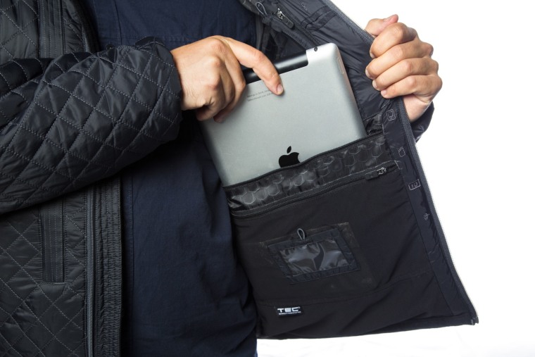 For the guy who carries a tablet, a laptop, a phone, headphones, and other tech devices everywhere he goes, try the SCOTTeVEST Off the Gridjacket.