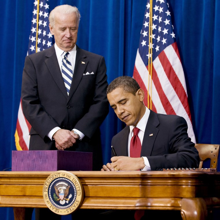 Image: U.S. President Barack Obama signs stimulus package bill at the Denver Museum of Nature and Science