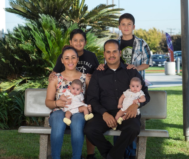 Maurice Gomez with his girlfriend, two twin daughters, and sons.
