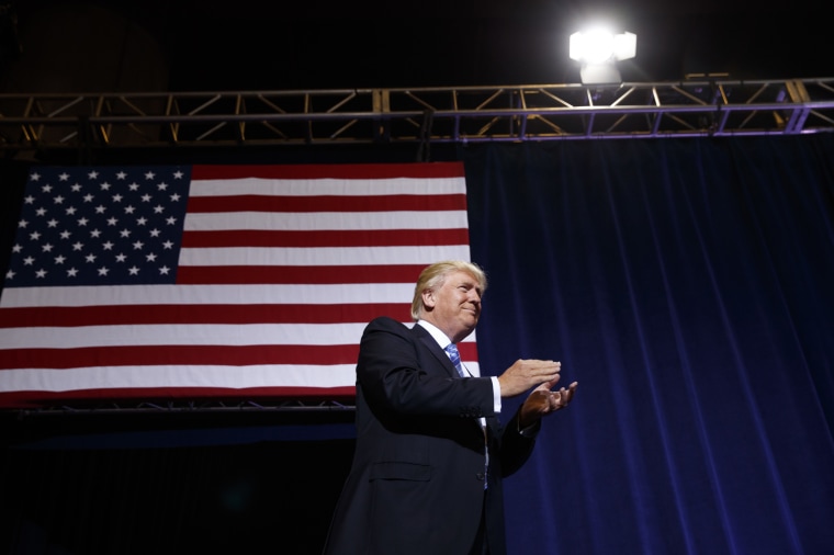 Image: Then, Republican presidential candidate Donald Trump arrives to deliver an immigration policy speech during a campaign rally at the Phoenix Convention Center, Aug. 31, 2016, in Phoenix, Ariz.