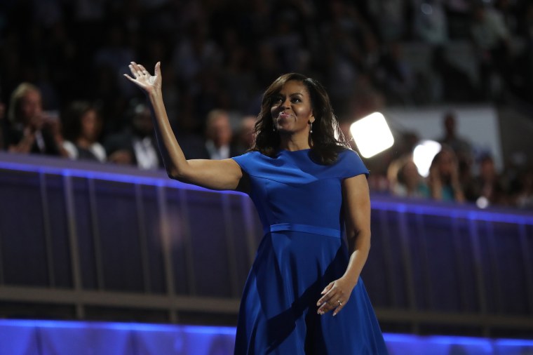 Image: First lady Michelle Obama acknowledges the crowd after delivering remarks on the first day of the Democratic National Convention at the Wells Fargo Center, July 25, 2016 in Philadelphia, Pa.