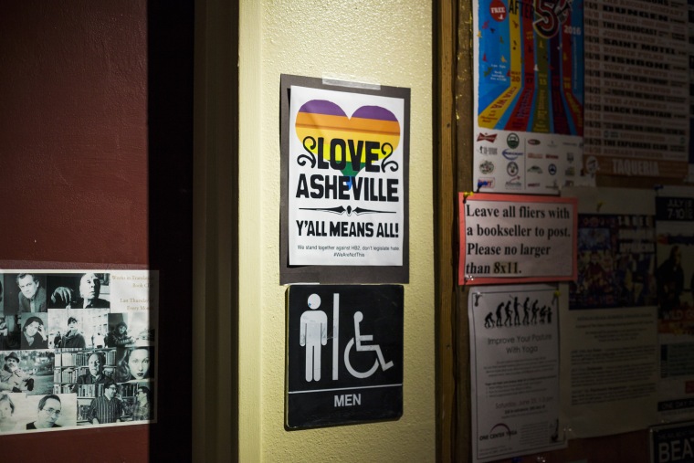 Image: A sign next to the men's bathroom inside Malaprop's Bookstore/Cafe in Asheville, North Carolina denounces North Carolina's HB2 legislation on June 21, 2016.