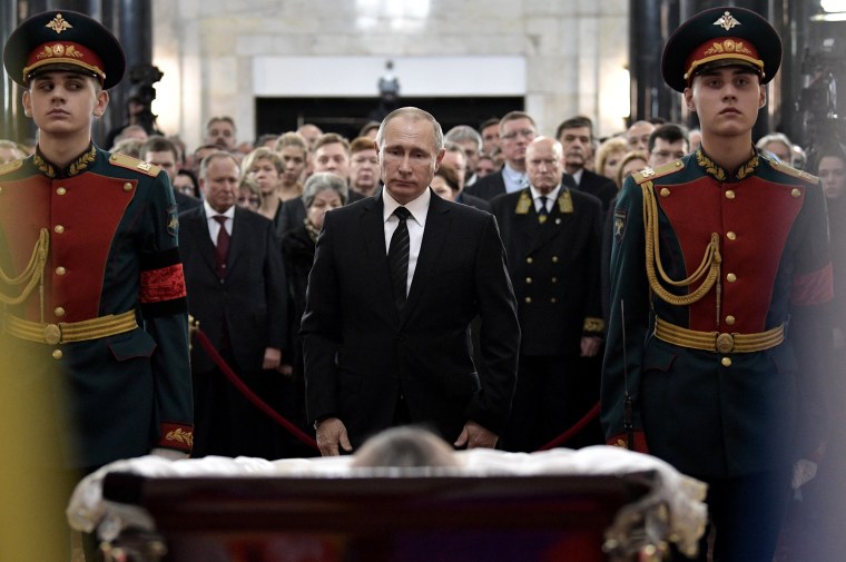 Image: Russian President Vladimir Putin attends a farewell ceremony for the Russian Ambassador to Turkey Andrei Karlov at the Foreign Ministry headquarters in Moscow, Russia, Dec. 22.