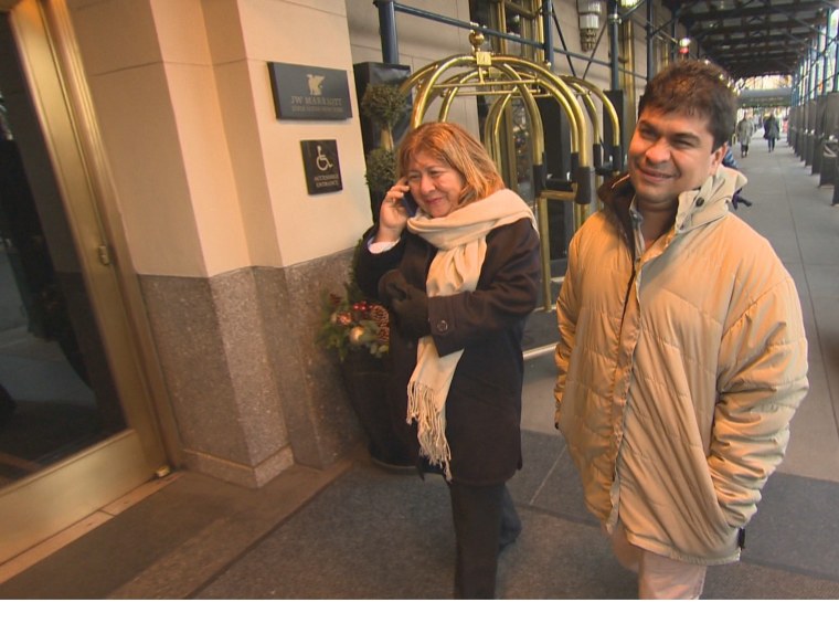 Jeison Aristizabal walking with his mother Maria Emilia Aristiz?bal.