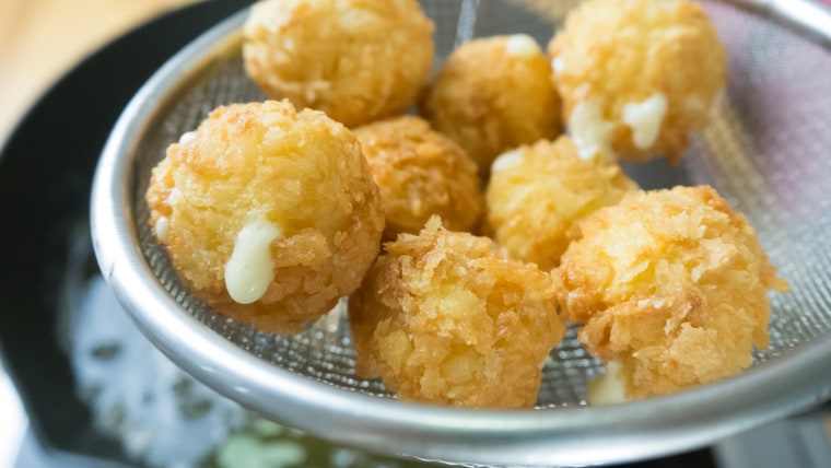 Cheese-stuffed potato puffs