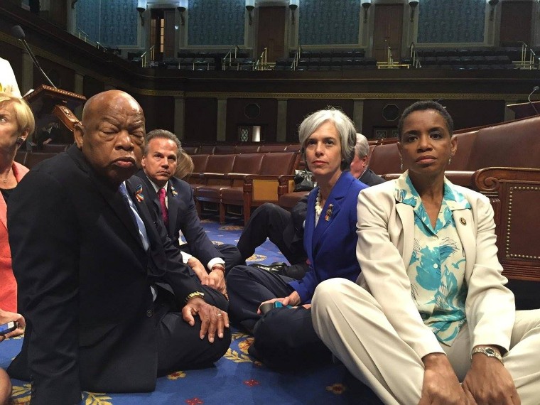 House Democrats, including civil rights leader and Democratic Georgia Rep. John Lewis, stage a sit-in on the House floor in June to demand gun control legislation.