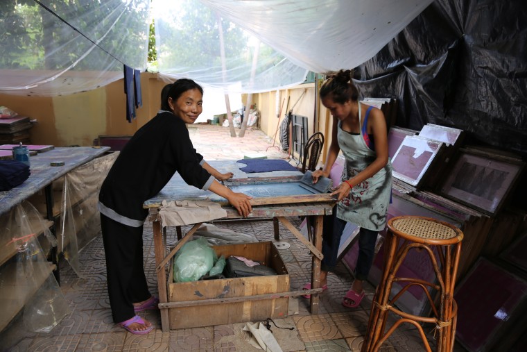 Workers at the tonl? workshop in Cambodia during from Remake. Tonl? designs and creates zero-waste clothing.