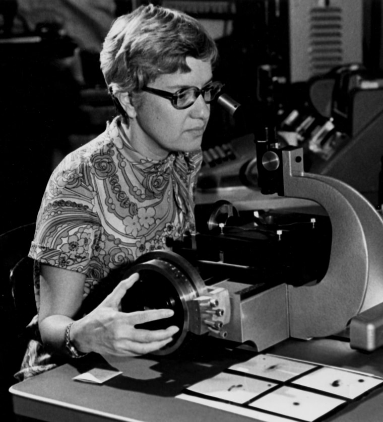 In this image taken in the 1970s and provided by the Carnegie Institution of Washington, Vera Rubin uses a measuring engine.