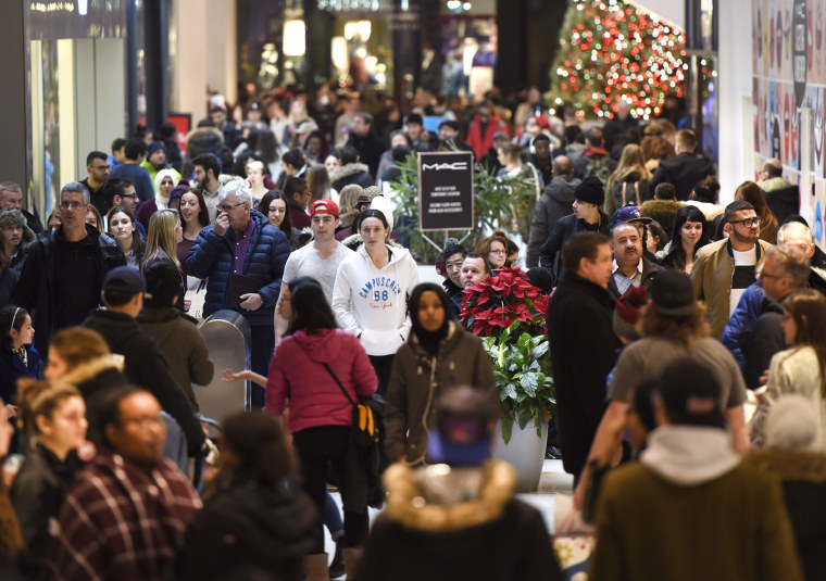 Image: Shoppers walk through the Rideau Centre