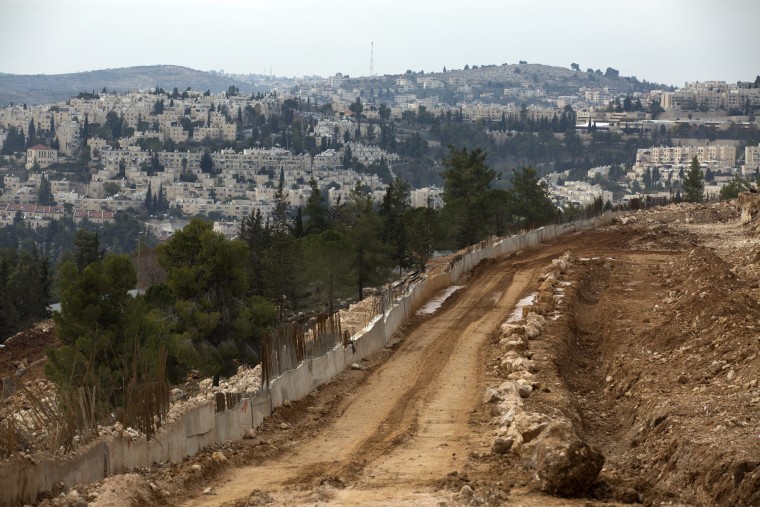 Image: Housing construction underway on the outskirts of the disputed Israeli 'settlement' of Ramat Shlomo