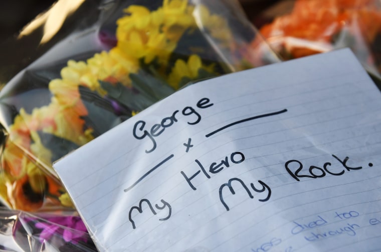 Image: Tributes made to late pop superstar George Michael outside his home in London