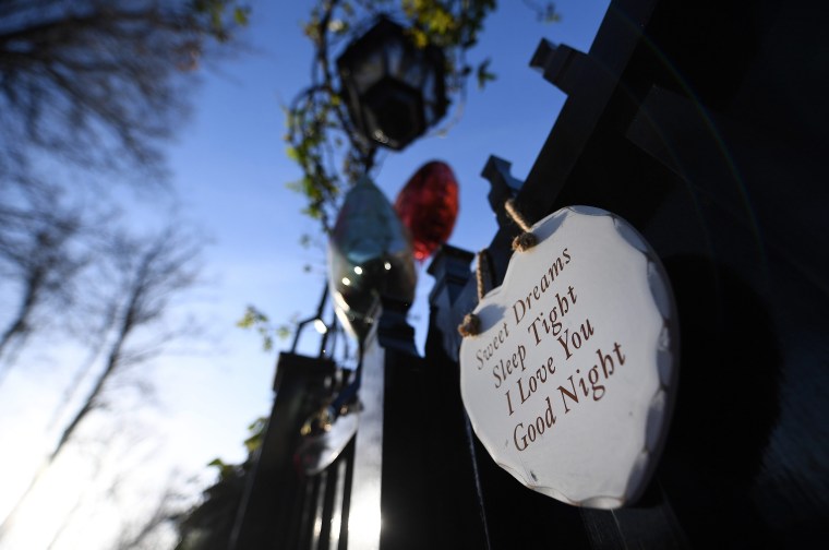 Image: Tributes made to late pop superstar George Michael outside his home in London