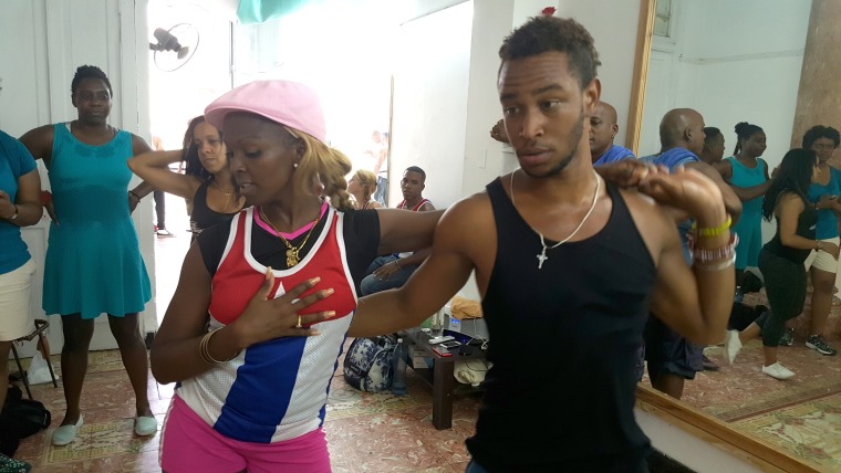 Dance instructors, Elier Lima and Janis Stable, show off their dance skills in front of a class at Pasion Caribeña, a dance school based in Old Havana, June 2016 .