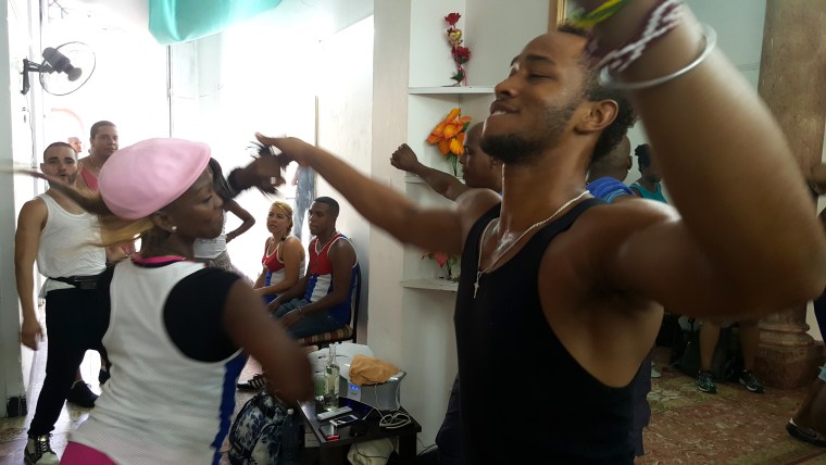 Dance instructors, Elier Lima and Janis Stable, show off their dance skills in front of a class at Pasion Caribeña, a dance school based in Old Havana, June 2016 .