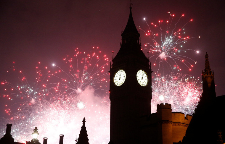 Image: Fireworks explode by the Big Ben clocktower in London