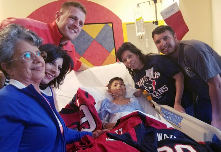 Texans' J.J. Watt surprises a boy hit by a car with new jerseys.