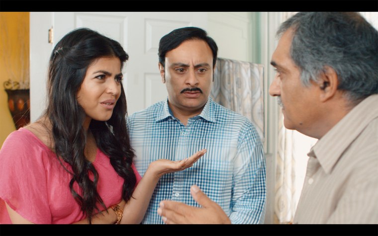 Dimple (played by Shenaz Treasuryvala), Hasmukh (played by Rajeev Varma), and Papaji (played by Kapil Bawa) in a still from "Brown Nation"